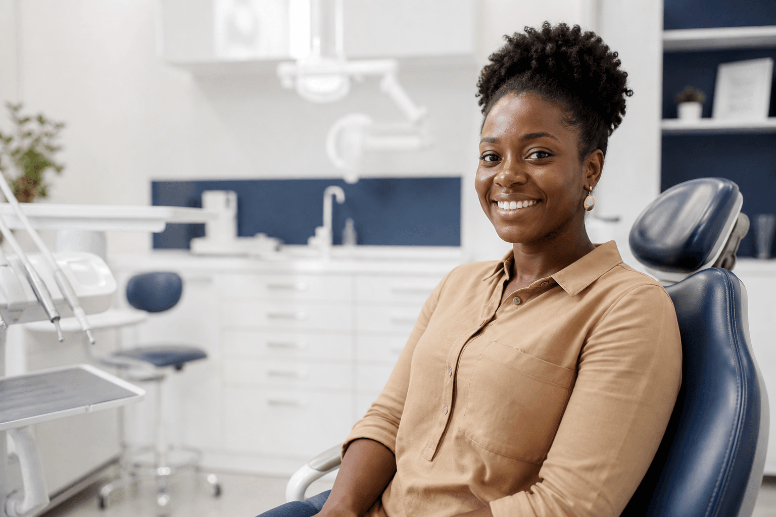 Black Ghanaian patient smiling in a contemporary dental studio